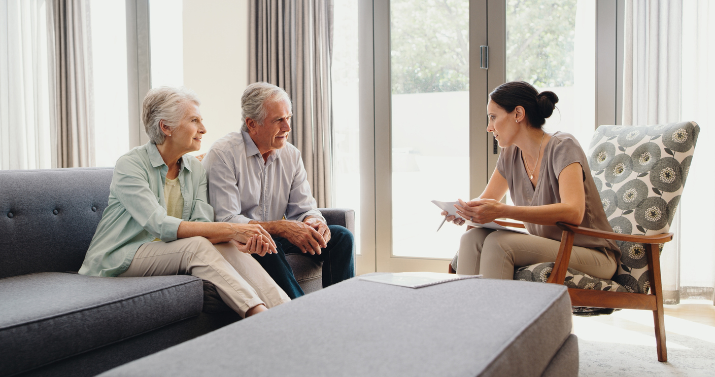 a elder family in talk with local agent