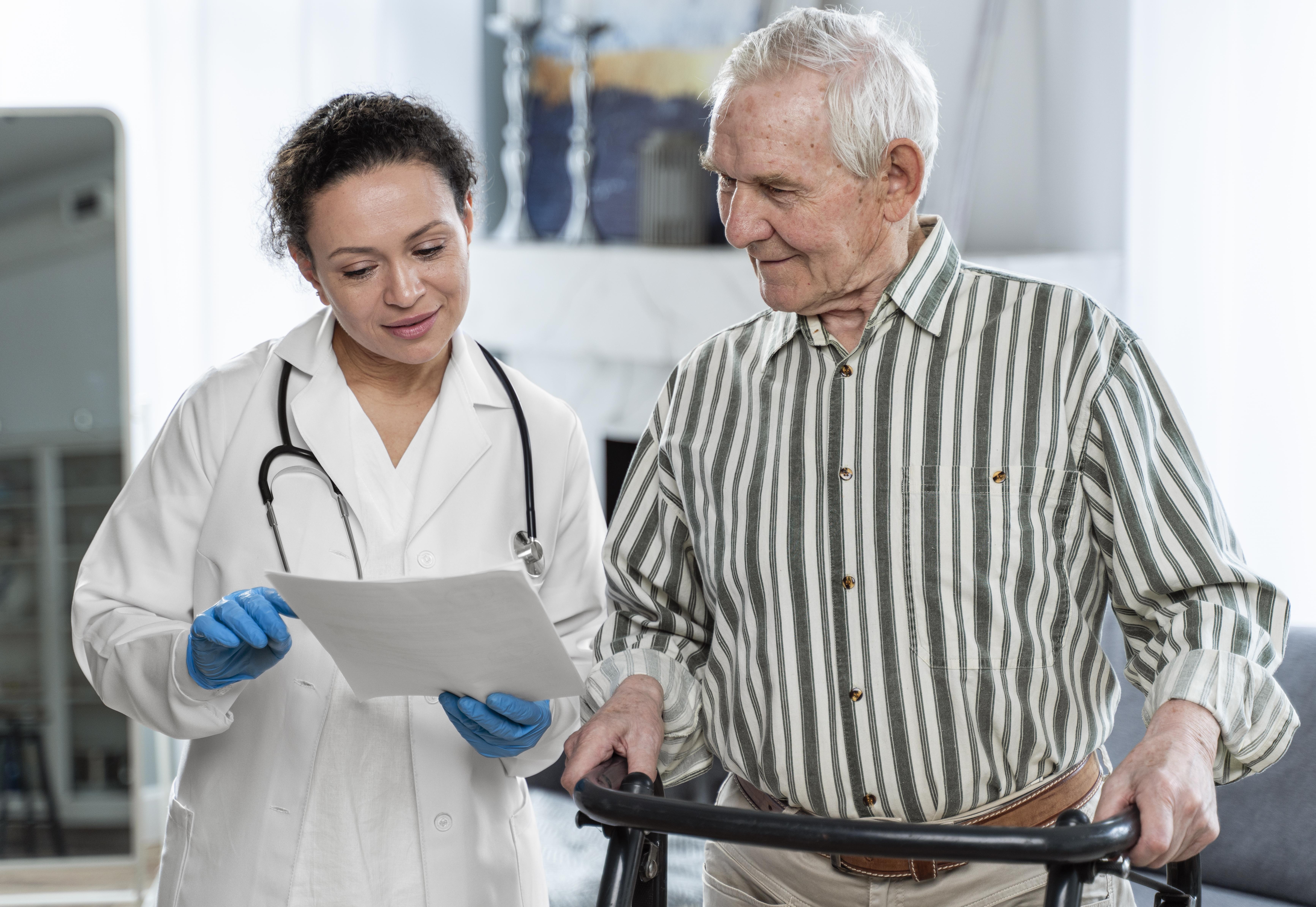 an elder person talking to his doctor